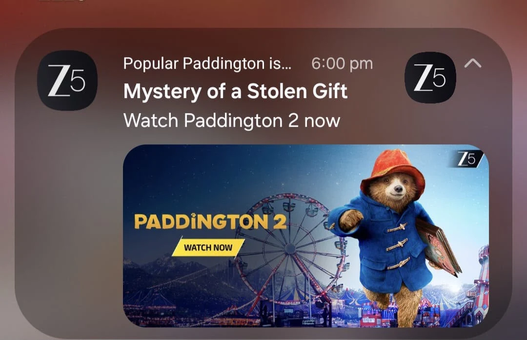 ZEE5 push notification: 'Popular Paddington is…' with the headline 'Mystery of a Stolen Gift' and the line 'Watch Paddington 2 now', over Paddington 2 key art.